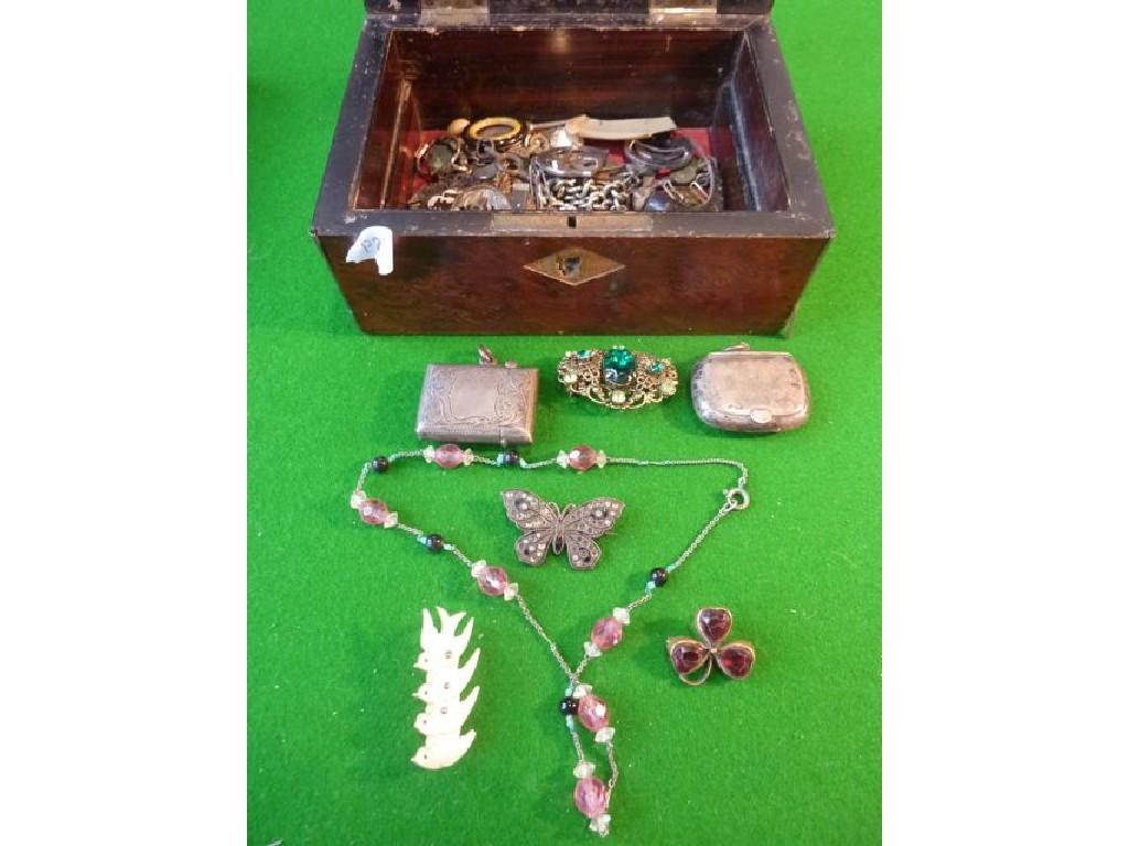 Appraisal: A small amboyna wood jewel box containing odd effects including