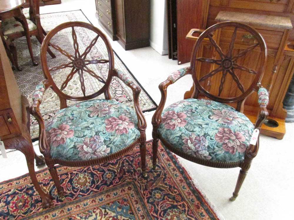 Appraisal: PAIR OF LOUIS XVI STYLE WHEEL-BACK ARMCHAIRS American late th