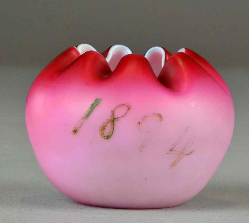 Appraisal: Victorian Peach Blow Finger BowlHandblown pinched top with pink finish