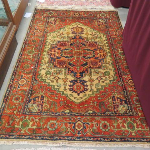 Appraisal: Heriz Persian Handmade Rug central medallion nice earthtone colors with