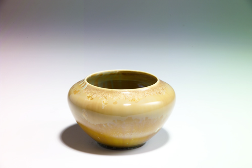 Appraisal: ADELAIDE ROBINEAU Porcelain squat vessel covered in beige and celadon