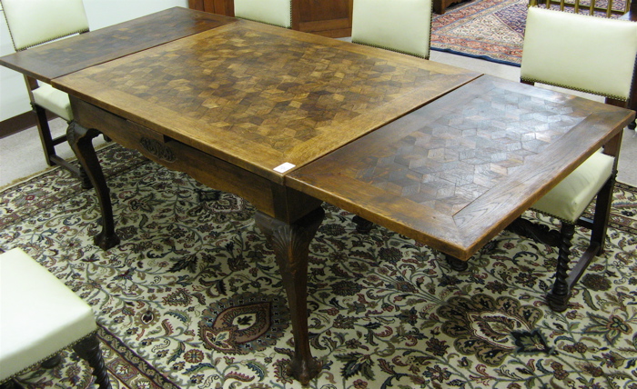 Appraisal: AN OAK PARQUET DINING TABLE French early th century the