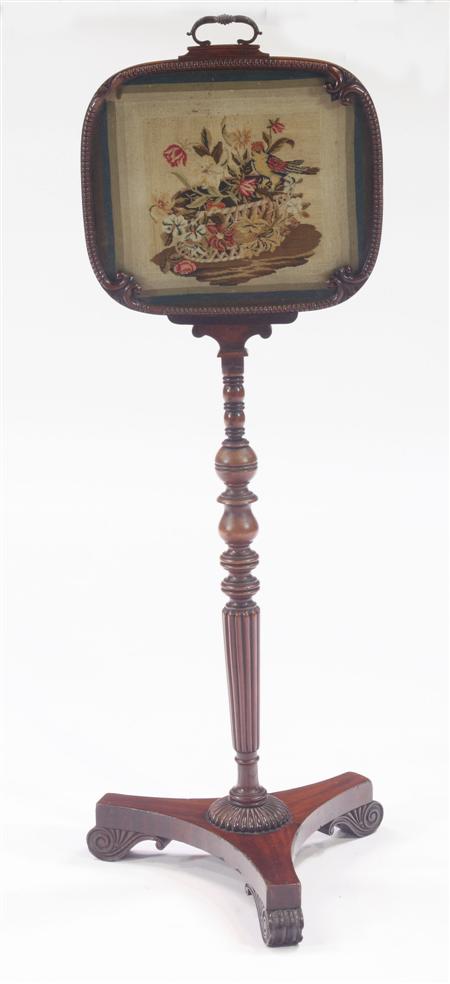 Appraisal: A Regency mahogany adjustable pole screen with a brass handle