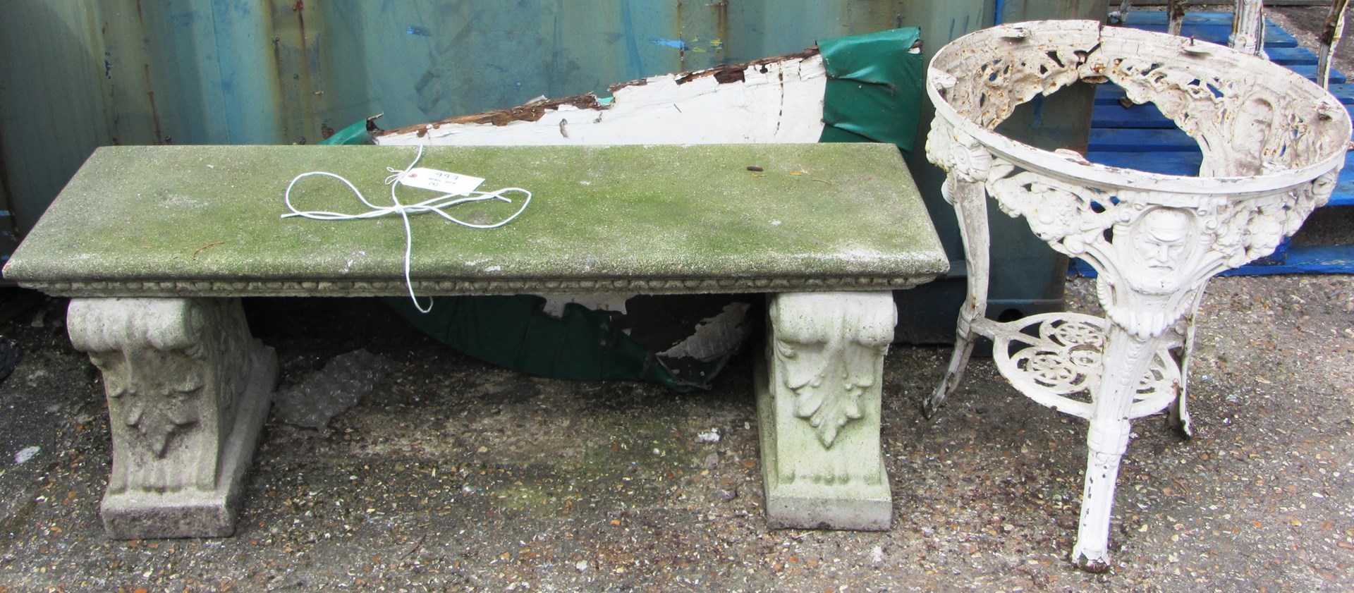 Appraisal: A reconstituted stone rectangular bench on a pair of scroll