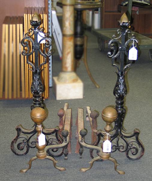 Appraisal: A pair of Baroque painted iron and brass andirons and