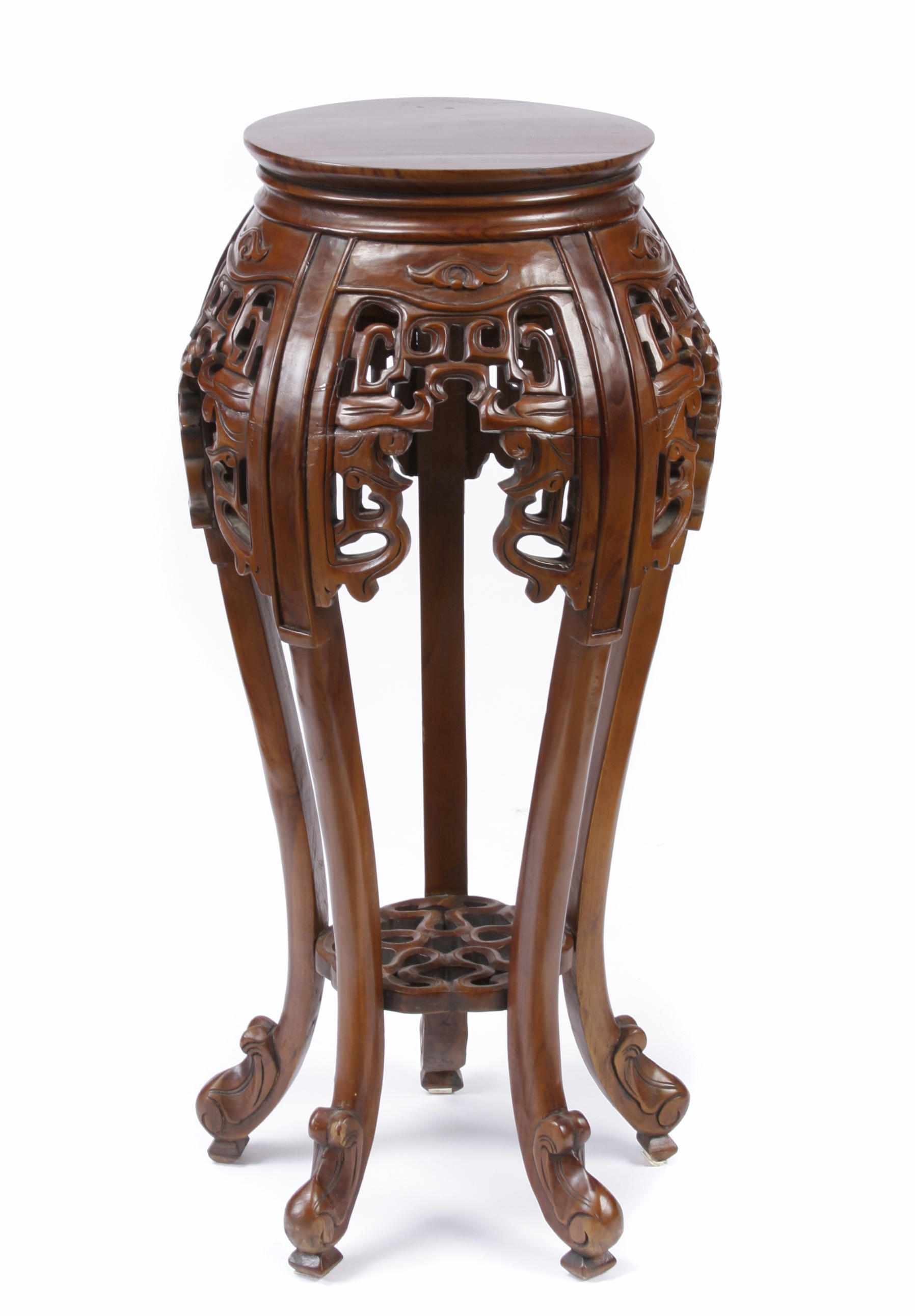 Appraisal: A pair of Chinese hardwood plant stands height in diameter