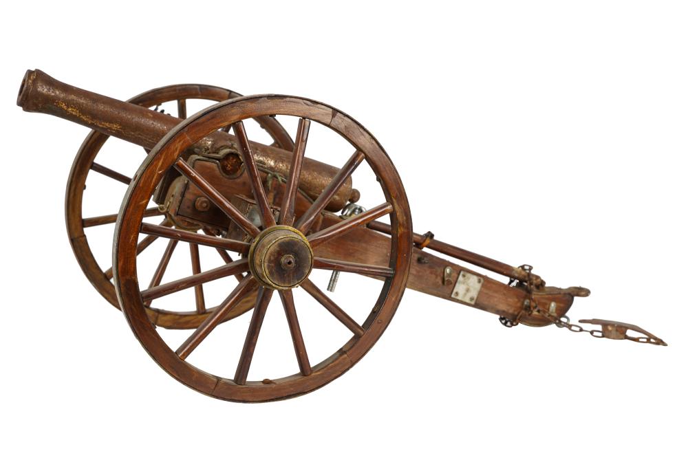 Appraisal: TABLE TOP CANNON MODELunmarked wood and metal Condition tear to