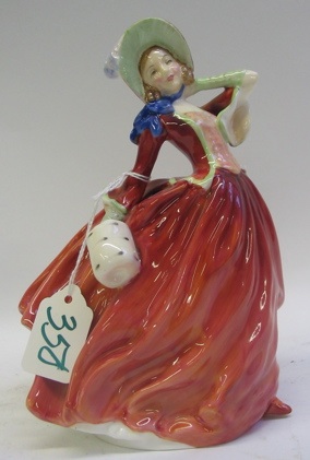 Appraisal: A ROYAL DOULTON PORCELAIN GLAZED FIGURE Autumn Breezes HN a