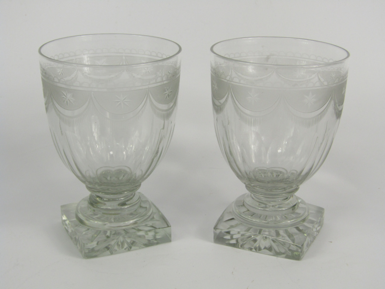 Appraisal: A pair of Regency style cut glass runners engraved and