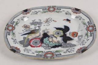 Appraisal: LARGE ENGLISH IRONSTONE MEAT PLATTER HAVING BIRD AND BUTTERFLY IN