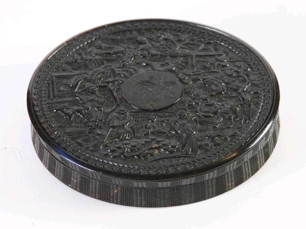 Appraisal: NINETEENTH CENTURY ORIENTAL PROFUSELY CARVED EBONY CIRCULAR SHALLOW BOX AND