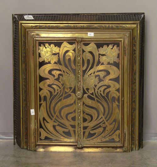 Appraisal: Art Nouveau brass fireplace gate h w