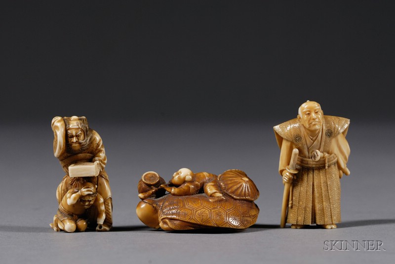 Appraisal: Three Ivory Netsuke th century a figure of Shoki a