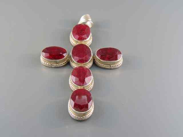 Appraisal: Ruby Cross six rich African gems totaling approx carats in