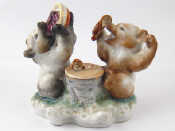 Appraisal: A Russian ceramic humorous group of two bears with a