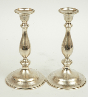 Appraisal: A PAIR OF AUSTRIAN SILVER CANDLE STICKS Maker's mark E