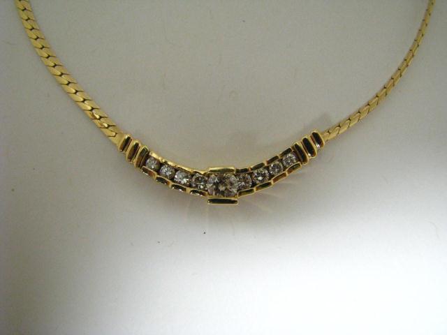 Appraisal: K yellow gold -inch necklace herringbone style with approximately ct