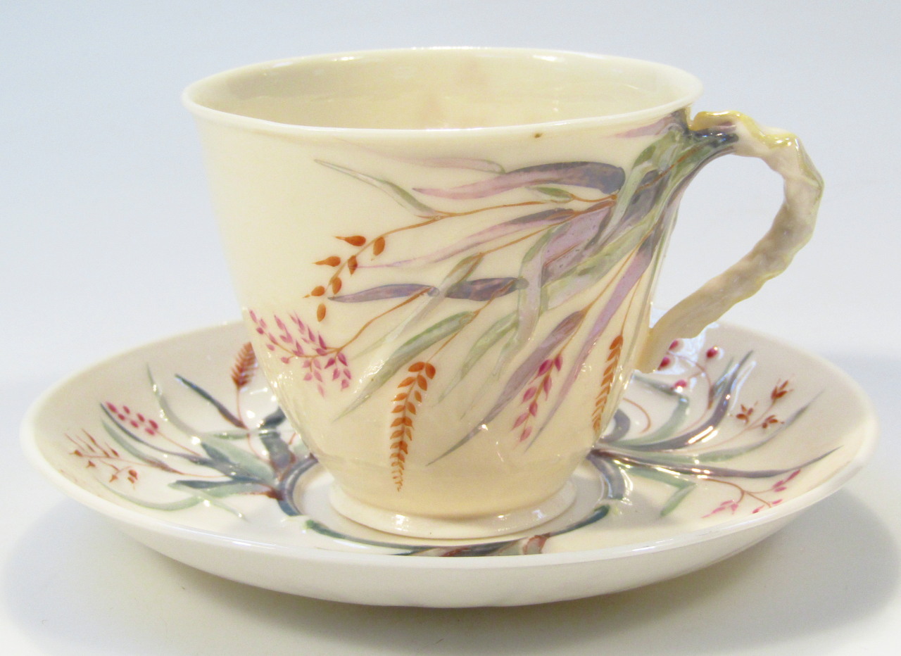 Appraisal: A Belleek Fine Parian china teacup and saucer Grass pattern