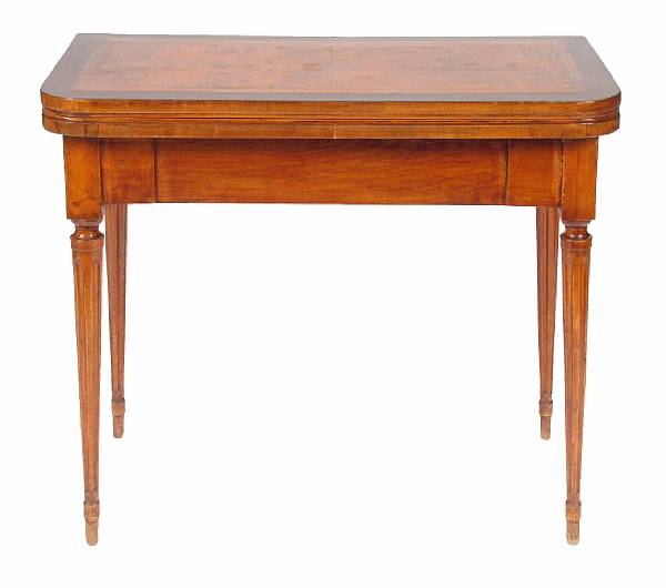 Appraisal: A George III style inlaid mahogany fold top games table