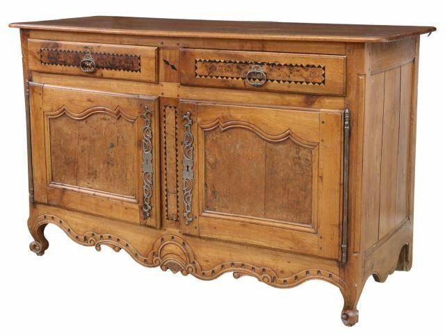 Appraisal: French Provincial mixed wood sideboard th c accented with contrasting