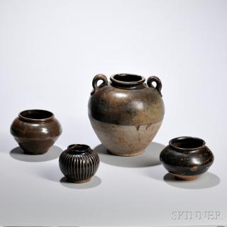 Appraisal: Four Brown-glazed Guan -type Jars - Four Brown-glazed Guan-type Jars