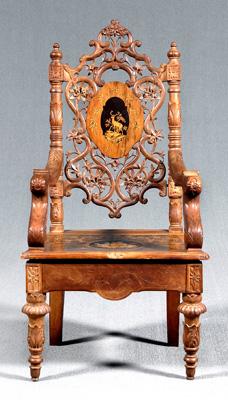 Appraisal: Marquetry inlaid burlwood armchair walnut and other mixed woods vine