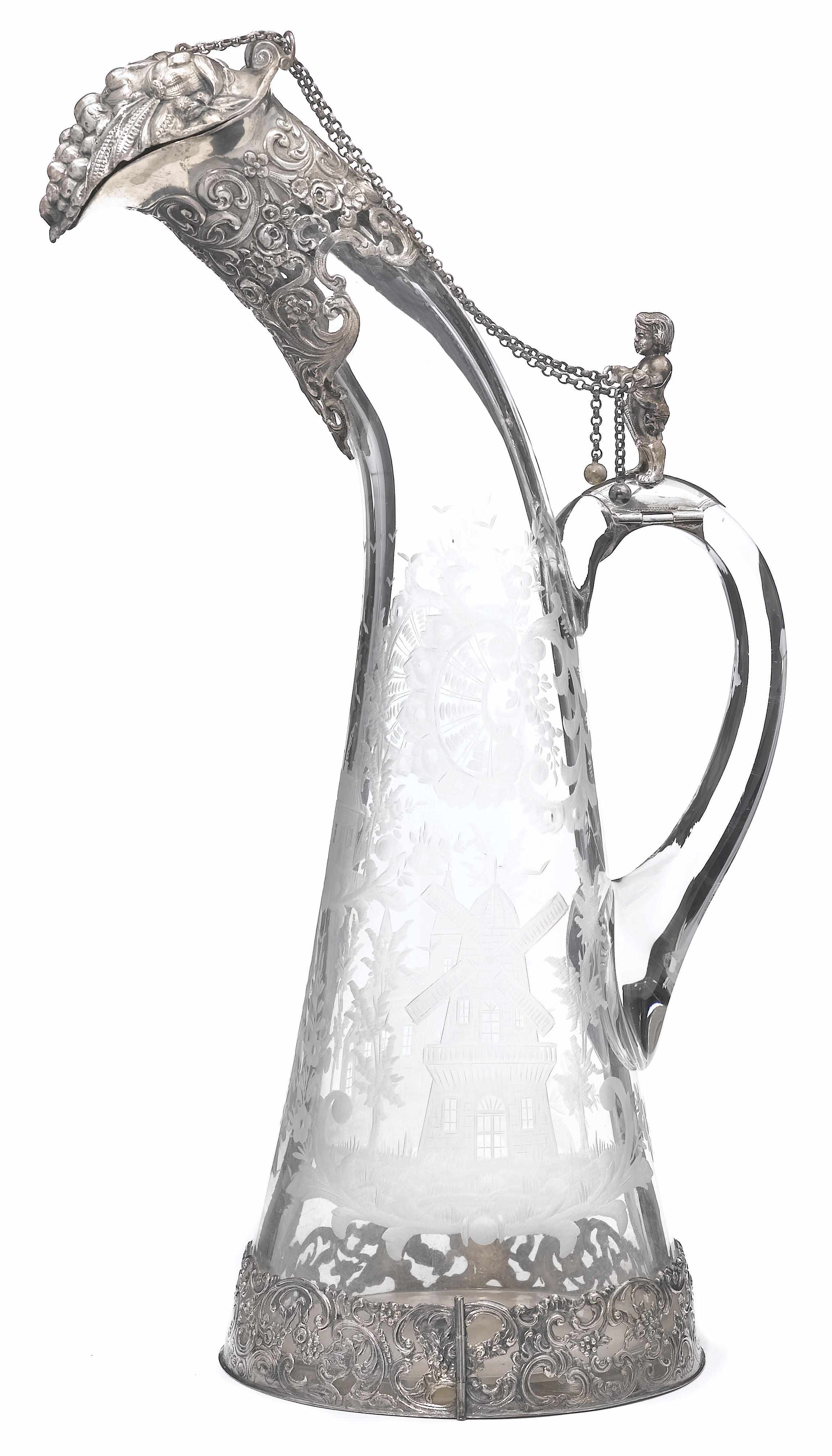 Appraisal: A German engraved glass horn form jug with silver mounts