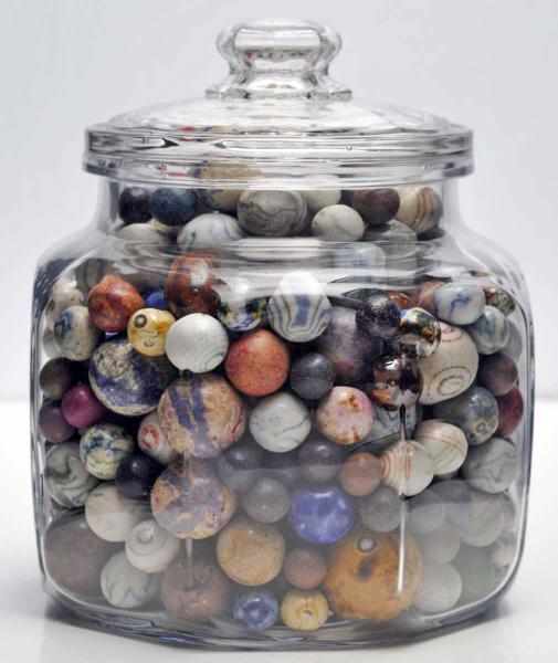 Appraisal: Octagonal Jar of Marbles Description Includes Benningtons clays lined and