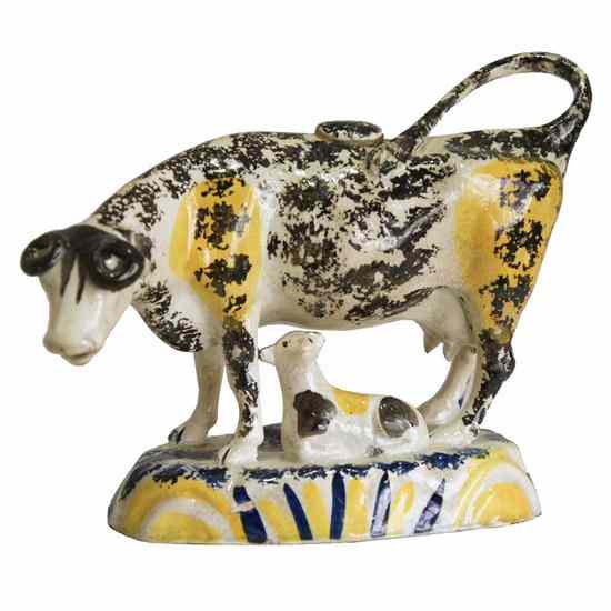 Appraisal: An English Staffordshire Pottery Cow Creamer circa depicting a cow