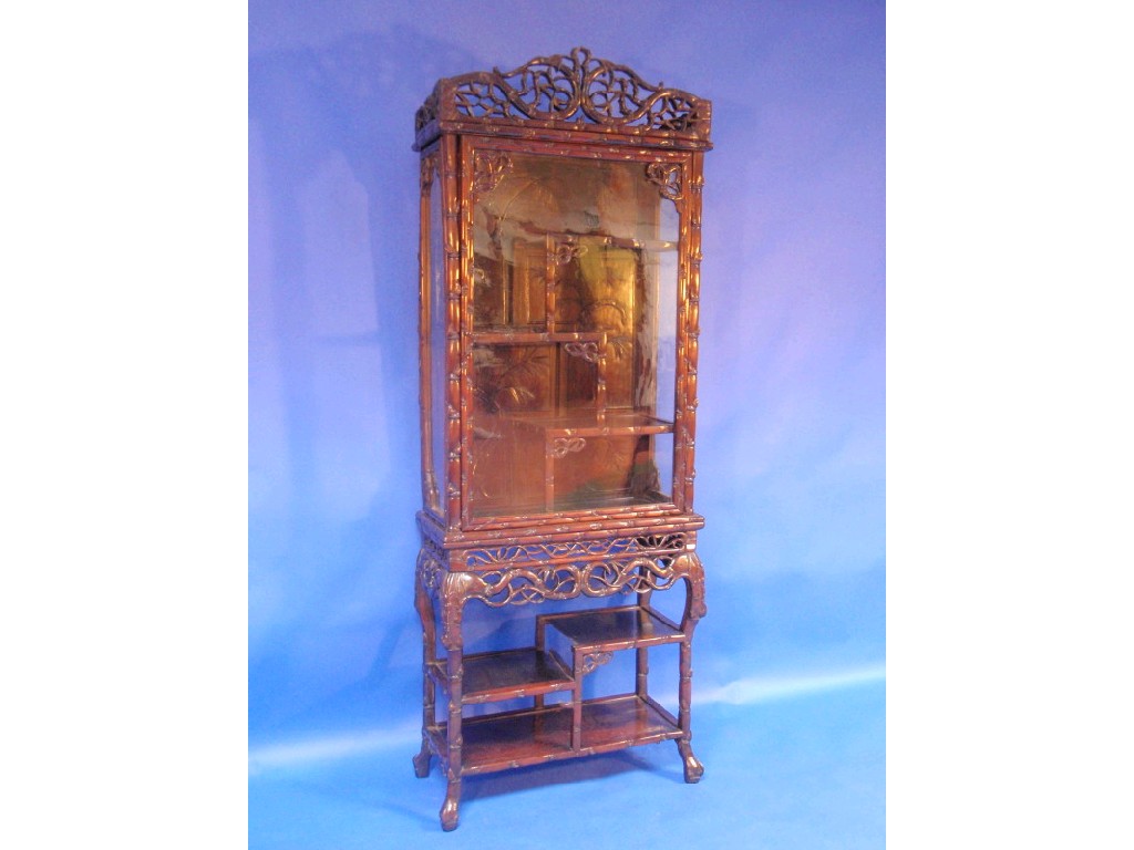 Appraisal: A thC Chinese rose wood display cabinet of sprouting bamboo