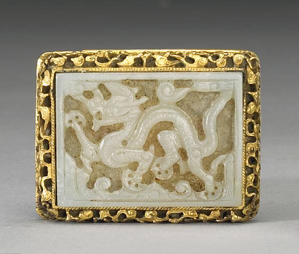 Appraisal: A nephrite and gilt bronze belt buckle th th Century