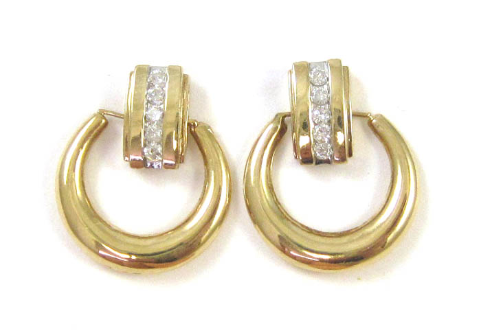 Appraisal: PAIR OF DIAMOND AND TEN KARAT GOLD EARRINGS each set