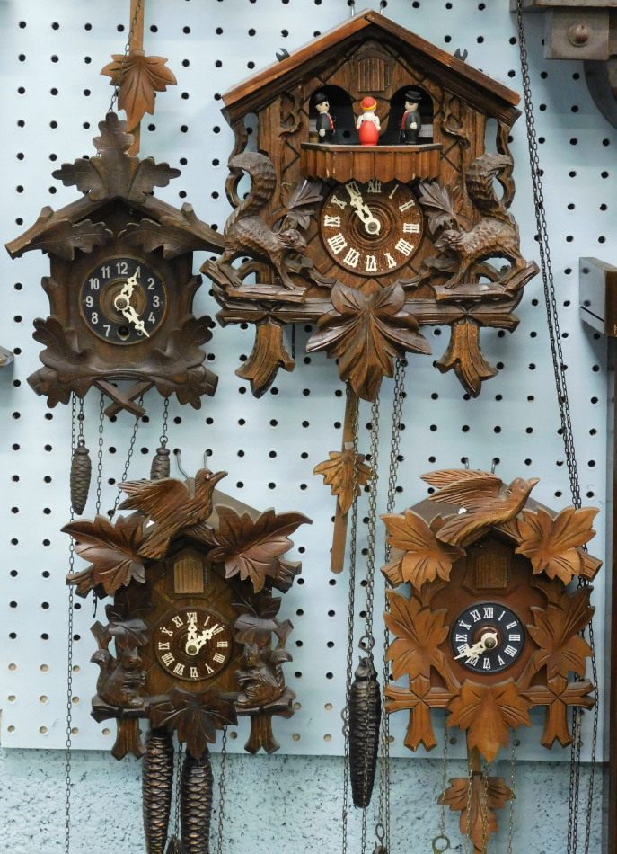 Appraisal: Four Black Forest type cuckoo clocks to include an example