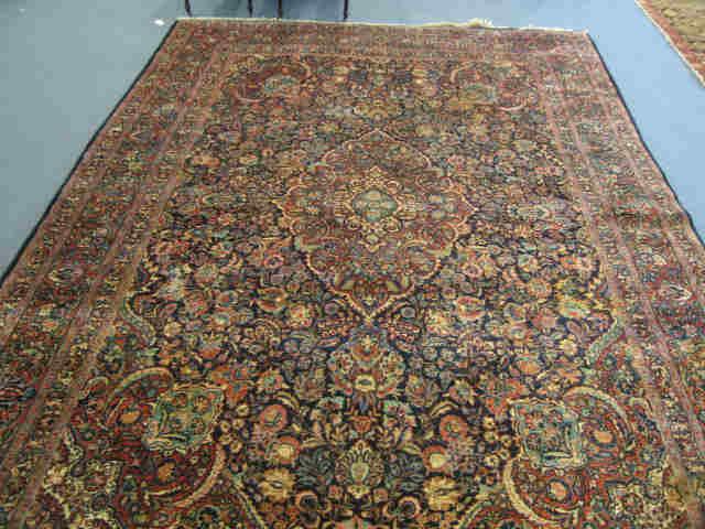 Appraisal: Lillihan Persian Handmade Room Size Rug rich overall floral reds