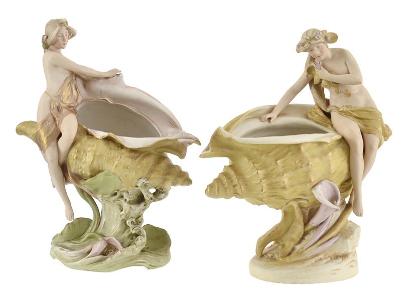 Appraisal: A PAIR OF ROYAL DUX PORCELAIN FIGURAL VASES each modelled