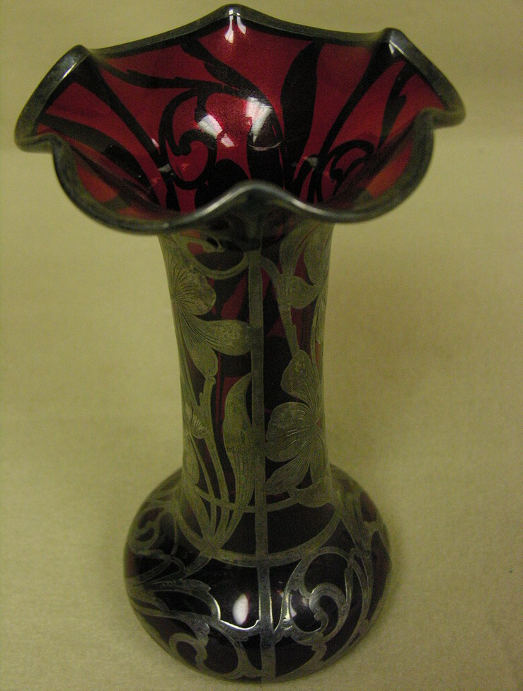 Appraisal: RUBY RED SILVER OVERLAY VASE Heavy sterling overlay Size with