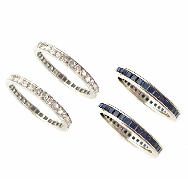 Appraisal: A collection of four eternity bands two circular cut diamond