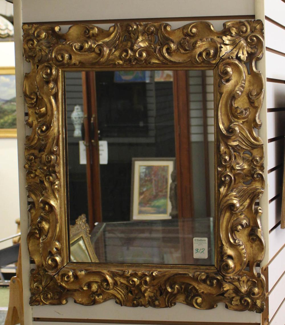 Appraisal: CARVED GILTWOOD FRAMED WALL MIRROR Italian Rococo design th century