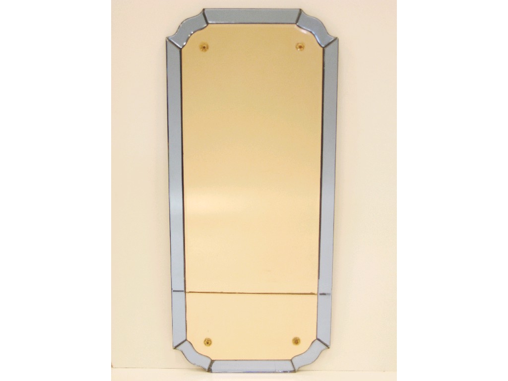 Appraisal: An Art Deco Wall Mirror with blue shaped edge and