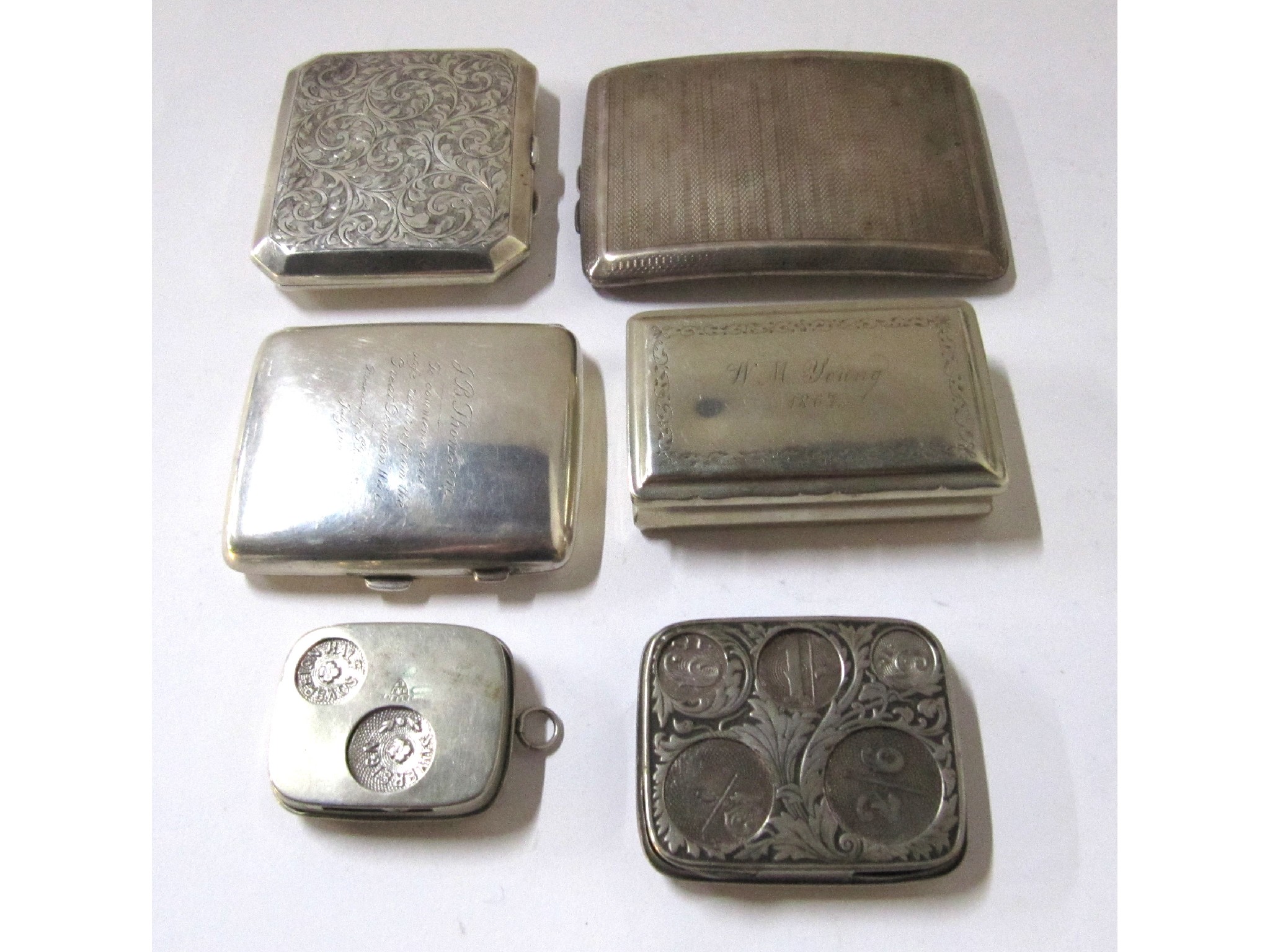 Appraisal: A lot comprising three silver cigarette cases assorted marks a