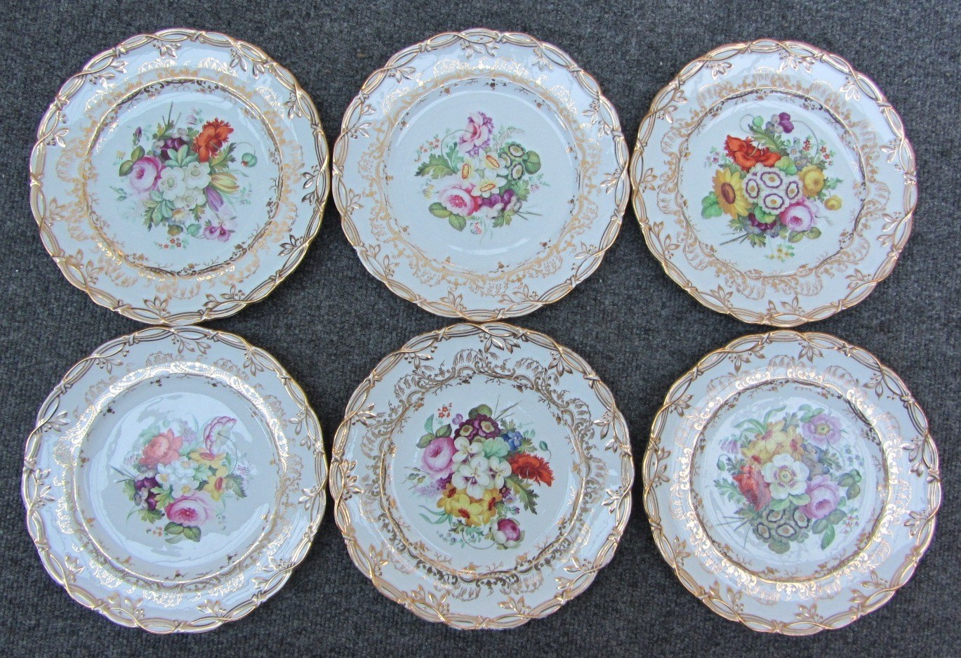 Appraisal: A set of six Coalport plates 's each painted with