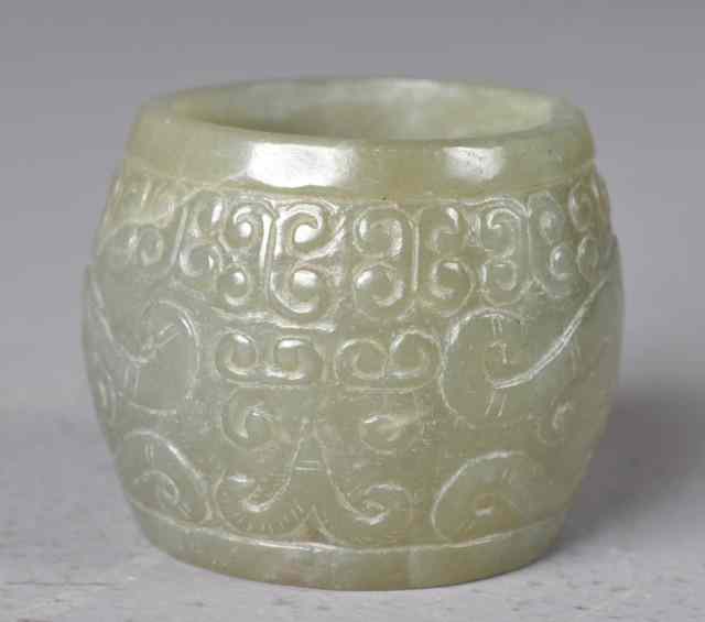 Appraisal: Chinese Carved Jade DrumCarved dark green jade drum depicting dragon