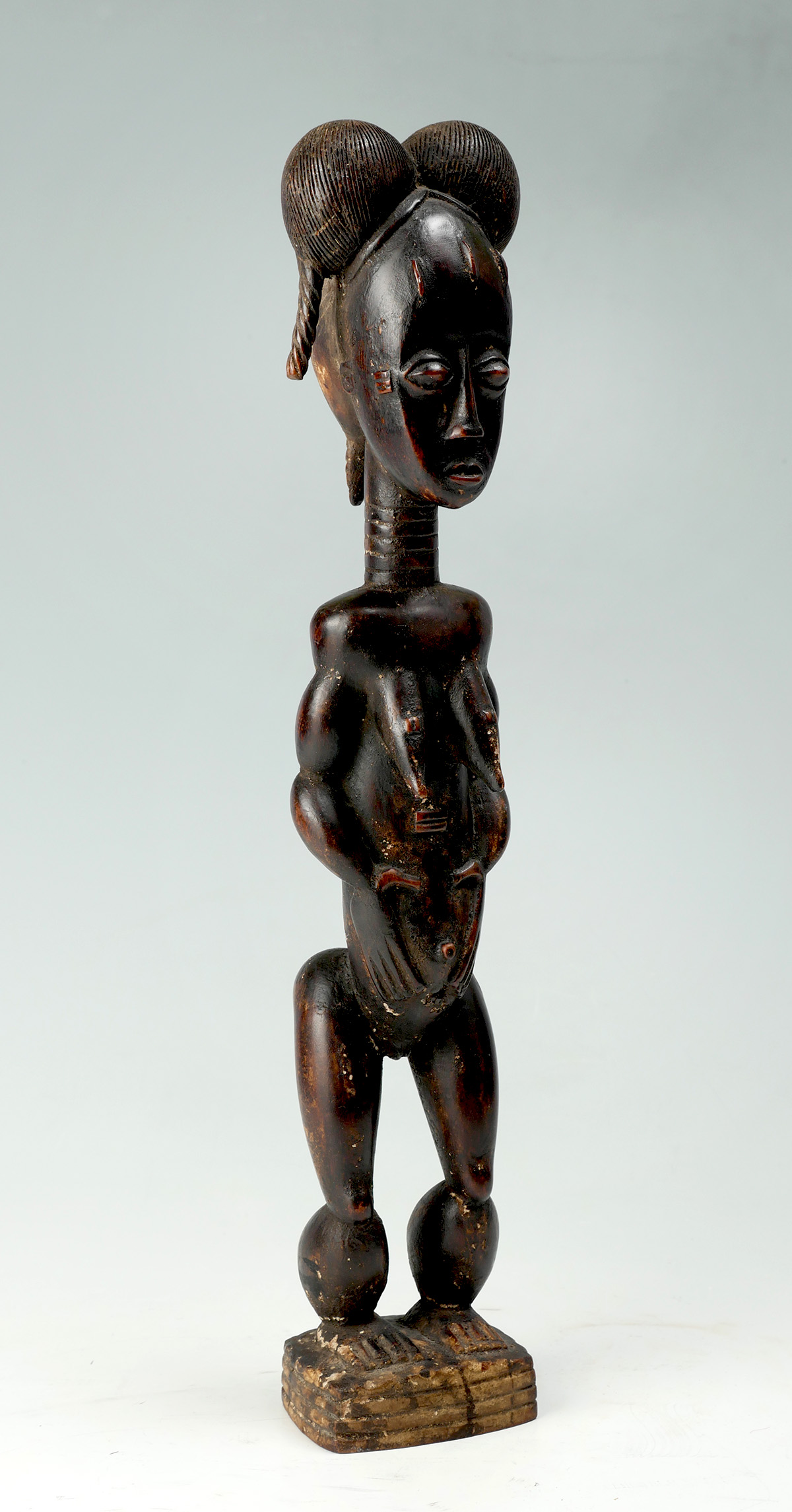 Appraisal: SMALL CARVED AFRICAN FERTILITY STATUE Carved African Fertility Goddess is