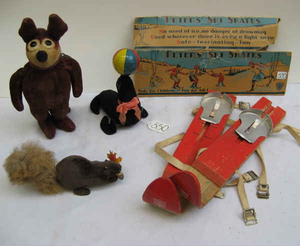 Appraisal: TWO WIND-UP TOYS A STUFFED ANIMAL AND PAIR OF WOOD