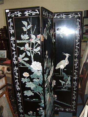 Appraisal: A th Century Oriental black lacquered screen decorated with flowering