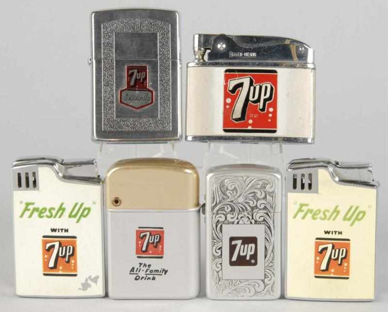 Appraisal: Lot of Assorted up Cigarette Lighters Description Includes two Nesor