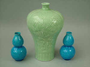 Appraisal: A Chinese porcelain pale celadon glazed meiping shape vase th