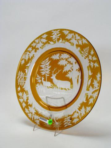 Appraisal: Amber cut to clear Bohemian glass charger with deer and