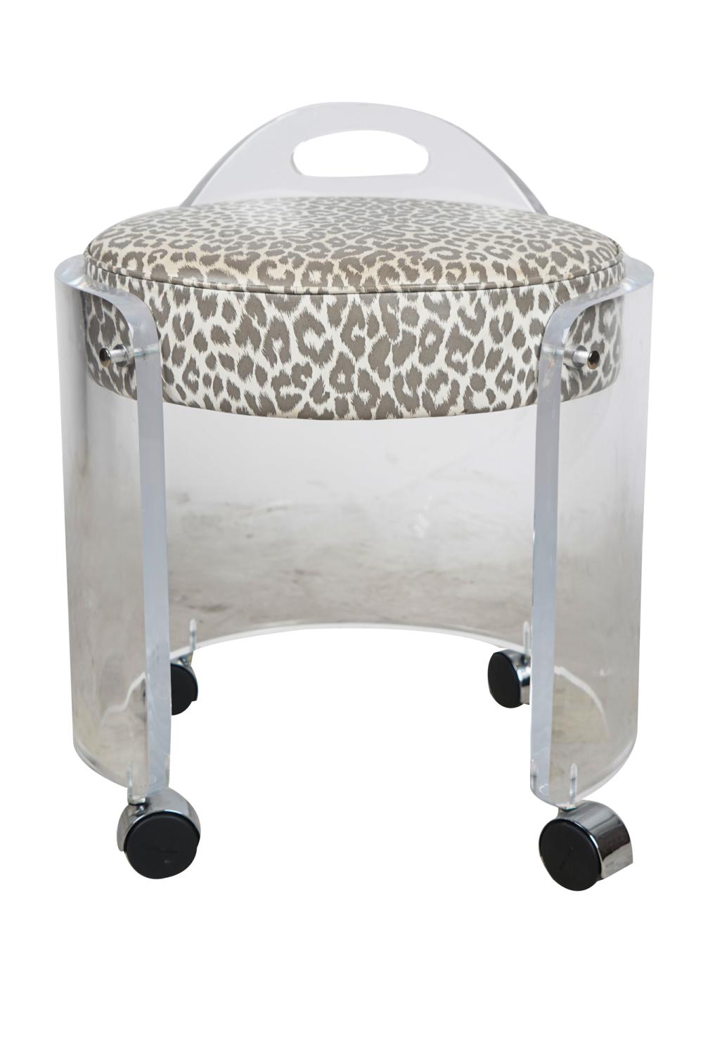 Appraisal: ACRYLIC VANITY STOOLunsigned with leopard print vinyl seat and wheels