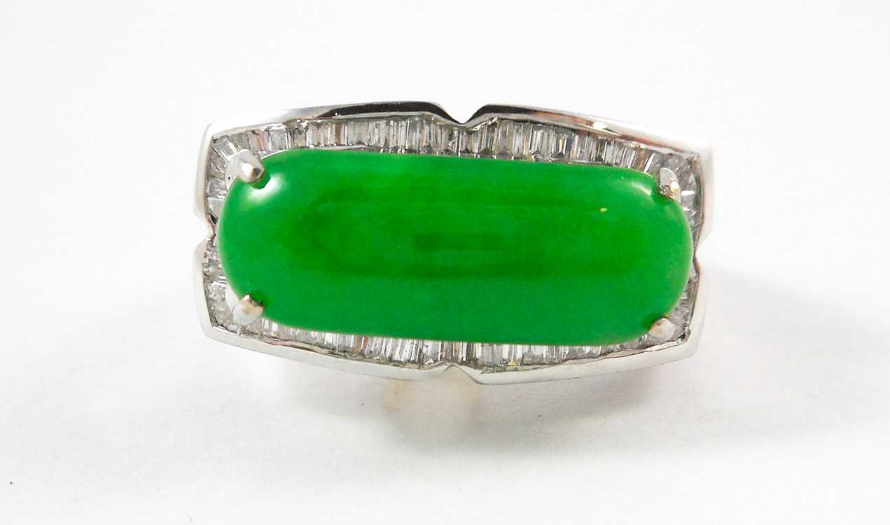 Appraisal: JADE DIAMOND AND FOURTEEN KARAT WHITE GOLD RING with baguette